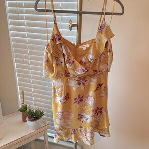 Yellow floral dress with delicate arm detail!